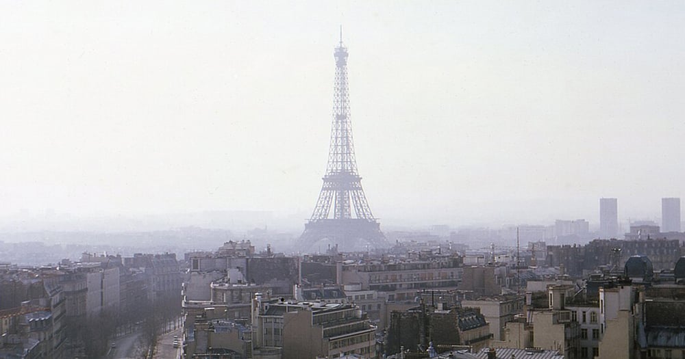 View across the rooftops of Paris toward the Eiffel Tower in the 1970s.